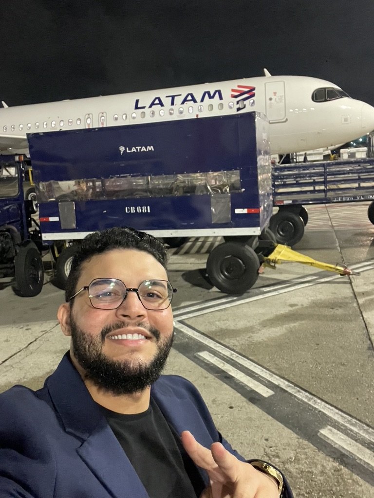Gabriel de Freitas Carvalho smiling at the camera in a navy blazer